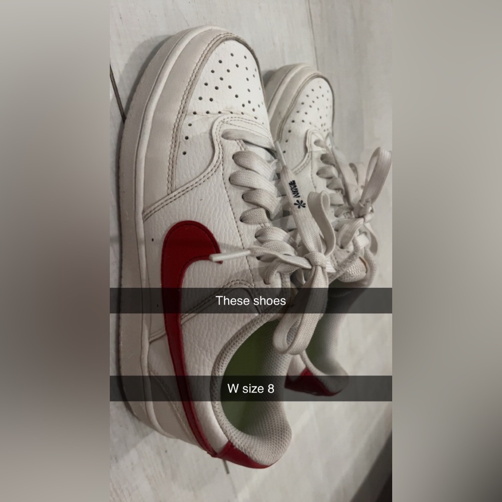 Nike shoes with dark red stripe